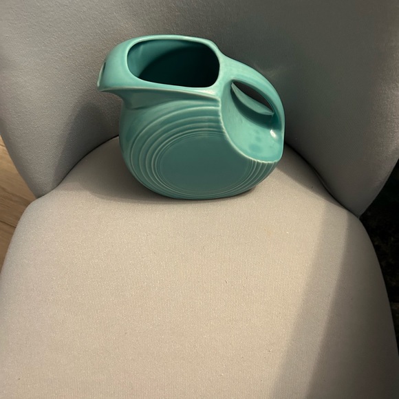 Large Turquoise Fiesta Ware Pitcher. 6 3/4” H x 8 1/2” W (Handle to Spout). - Picture 8 of 8